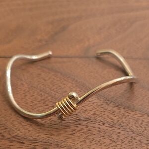 Elegant Silver and Gold-Toned Bracelet